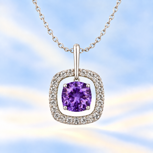 Amethyst pendant with a 7 mm cushion-cut in white gold-plated 925 silver, accented by a moissanite halo. Elegant and refined. Available now at BSI Jewelry.