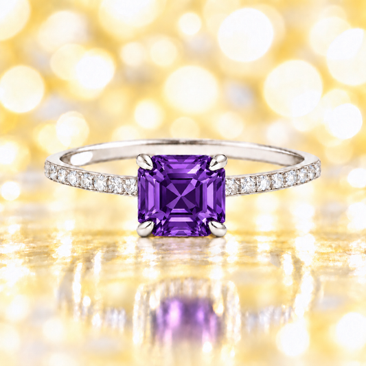 Amethyst ring with a 6 mm Asscher-cut in white gold-plated 925 silver, accented with moissanite and elegant purple brilliance. Available now at BSI Jewelry.