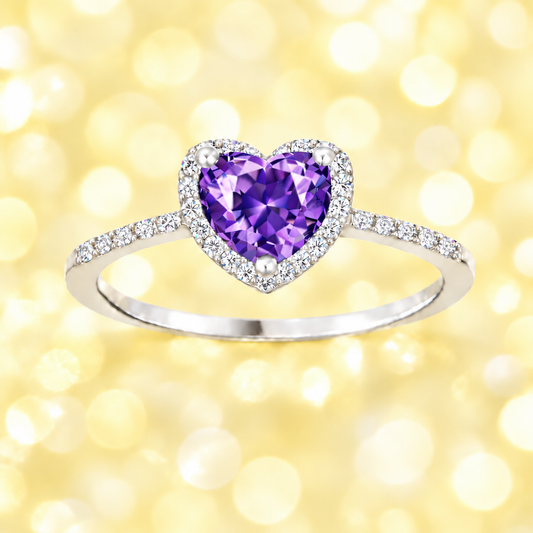 Amethyst ring with a 6 mm heart cut, crafted in white gold-plated 925 silver and accented with moissanite. Available now at BSI Jewelry.