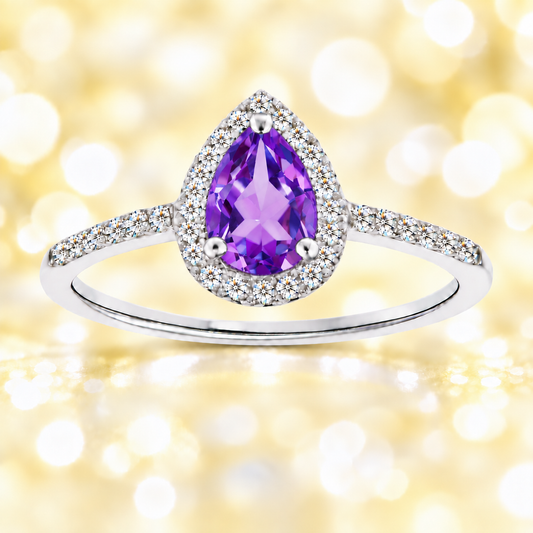Amethyst ring with a 7×5 mm pear cut, with moissanite in white gold-plated 925 silver. Elegant and timeless for daily wear. Available now at BSI Jewelry.