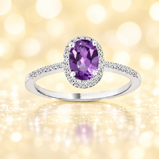 Amethyst ring with a 7×5 mm oval-cut in white gold-plated 925 silver, accented with moissanite. Elegant and refined for daily wear. Available now at BSI Jewelry.