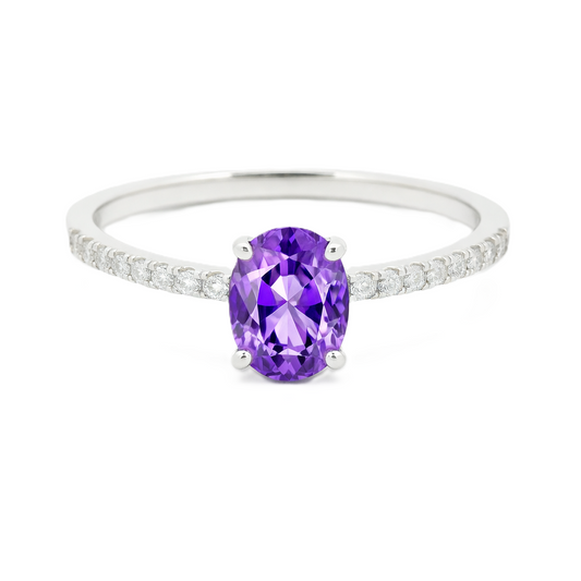 Amethyst ring with a 7×5 mm oval-cut stone and moissanite accents in white gold plated 925 silver. Elegant for daily wear. Available now at BSI Jewelry.