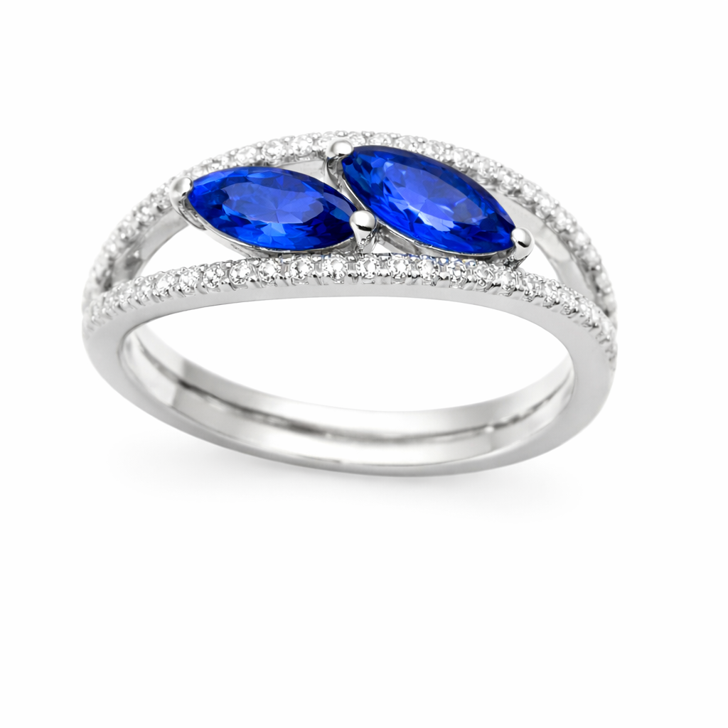 Blue sapphire crossover ring with 6×3 mm marquise in white gold-plated 925 silver, accented with moissanite. Elegant and contemporary. Available now at BSI Jewelry.