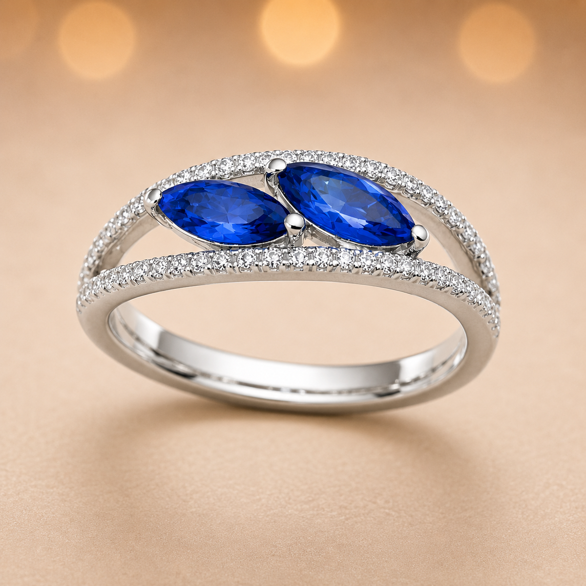 Blue sapphire crossover ring with 6×3 mm marquise in white gold-plated 925 silver, accented with moissanite. Elegant and contemporary. Available now at BSI Jewelry.