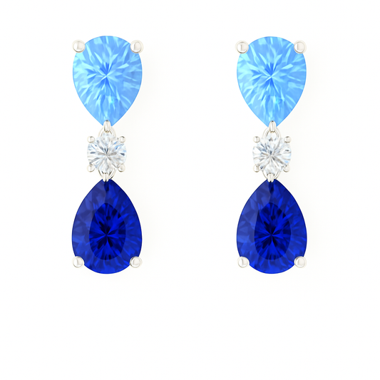 Elegant blue sapphire drop stud earrings with 6×4 mm pear-cut stones, crafted in white gold-plated 925 silver with palladium-added alloy. Now at BSI Jewelry.