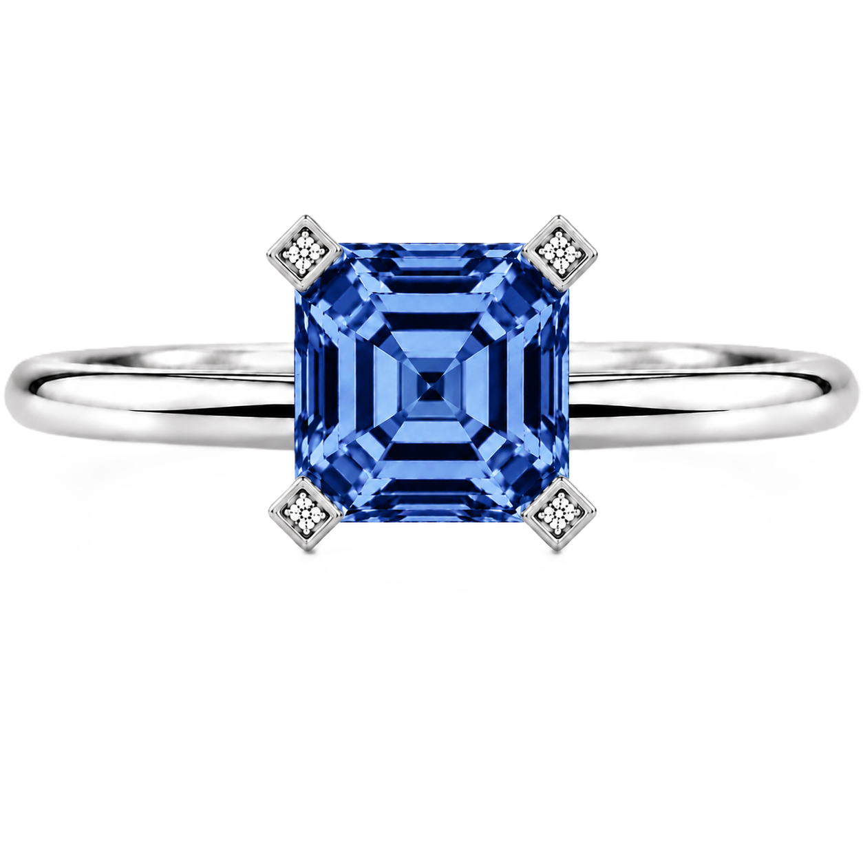 Royal blue sapphire engagement ring with a 6 mm asscher-cut center stone, crafted in white gold plated 925 silver. Available now at BSI Jewelry.