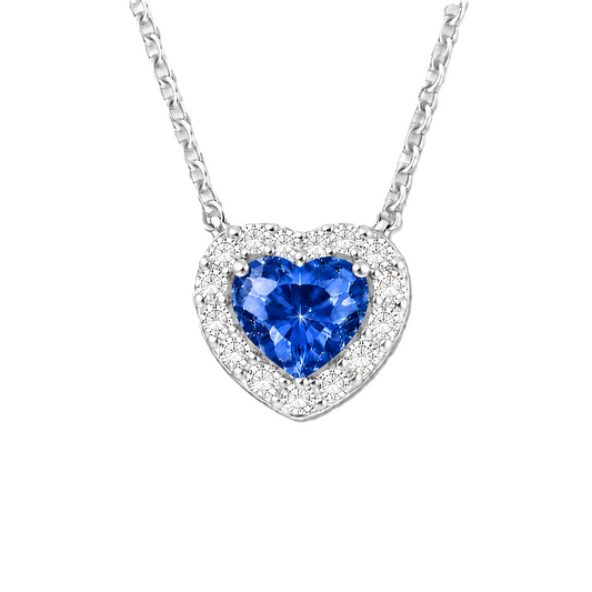 Blue sapphire heart necklace with 6 mm center stone in white gold-plated 925 silver. Elegant and timeless for daily wear. Available now at BSI Jewelry.