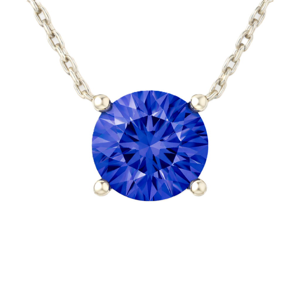 Blue sapphire necklace with a 6 mm round-cut gemstone in white gold-plated 925 silver. Elegant, refined, and perfect for daily wear. Available now at BSI Jewelry.
