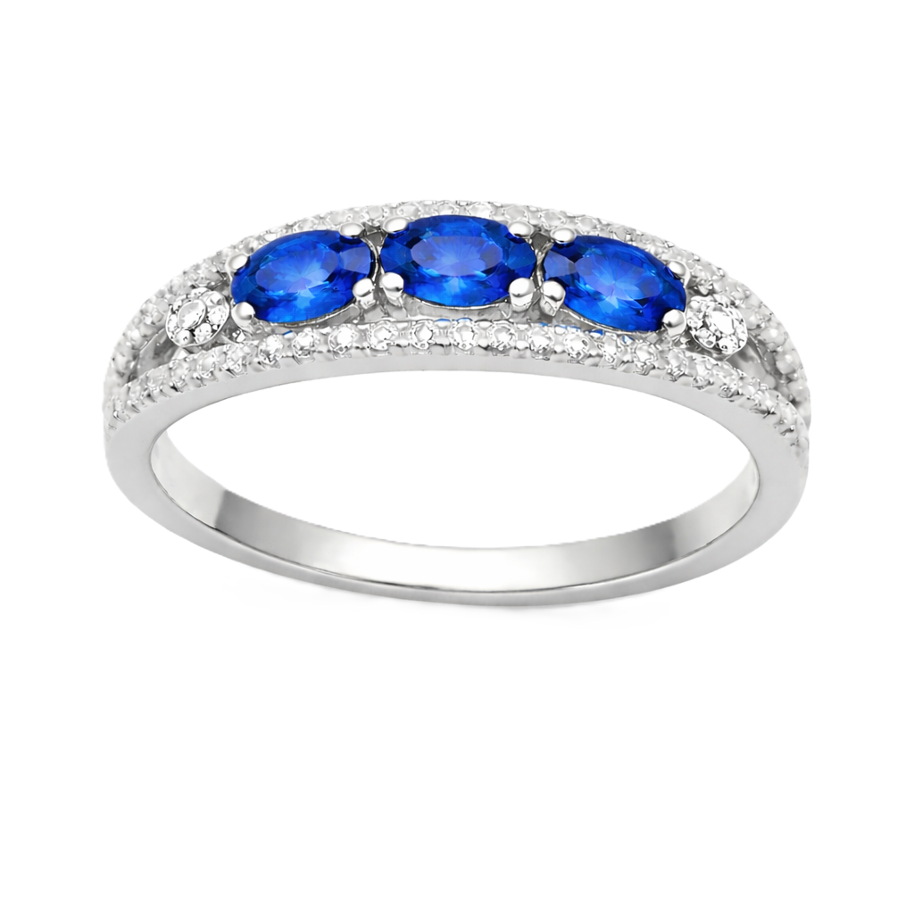 Blue sapphire ring with 5×3 mm oval stones in white gold-plated 925 silver. Classic, elegant, and hypoallergenic. Available now at BSI Jewelry.