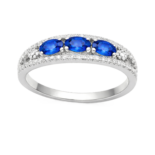 Blue sapphire ring with 5×3 mm oval stones in white gold-plated 925 silver. Classic, elegant, and hypoallergenic. Available now at BSI Jewelry.