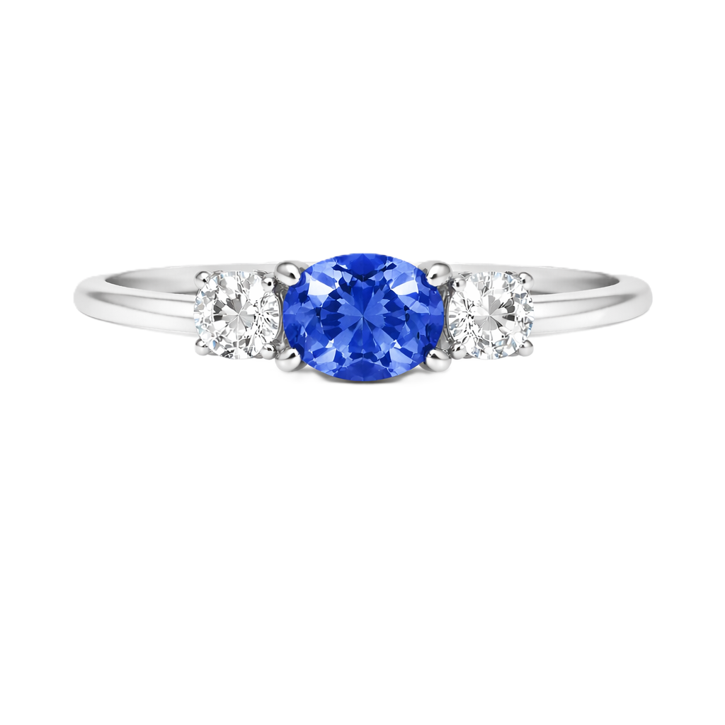 Blue sapphire ring, 5×4 mm oval with moissanite accents in white gold-plated 925 silver. Elegant and hypoallergenic. Available now at BSI Jewelry.