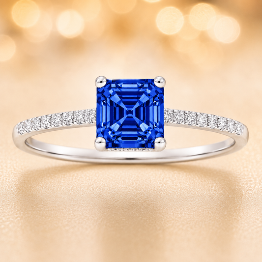 Blue sapphire ring, 6 mm Asscher, set in white gold-plated 925 silver. Hypoallergenic and refined for daily wear. Available now at BSI Jewelry.