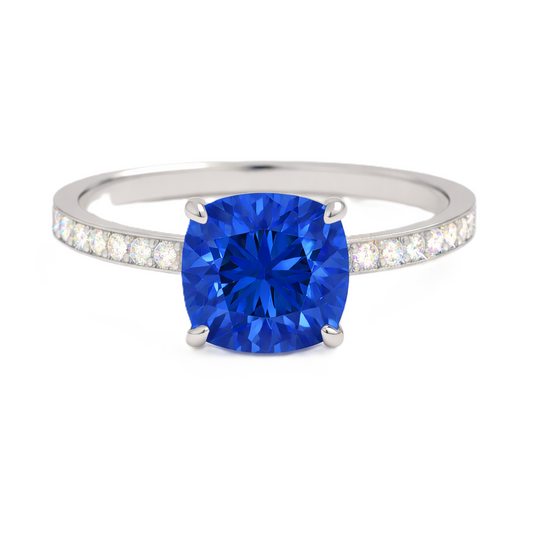 Blue sapphire ring, 6 mm cushion, crafted in white gold-plated 925 silver. Hypoallergenic and elegant for daily wear. Available now at BSI Jewelry.