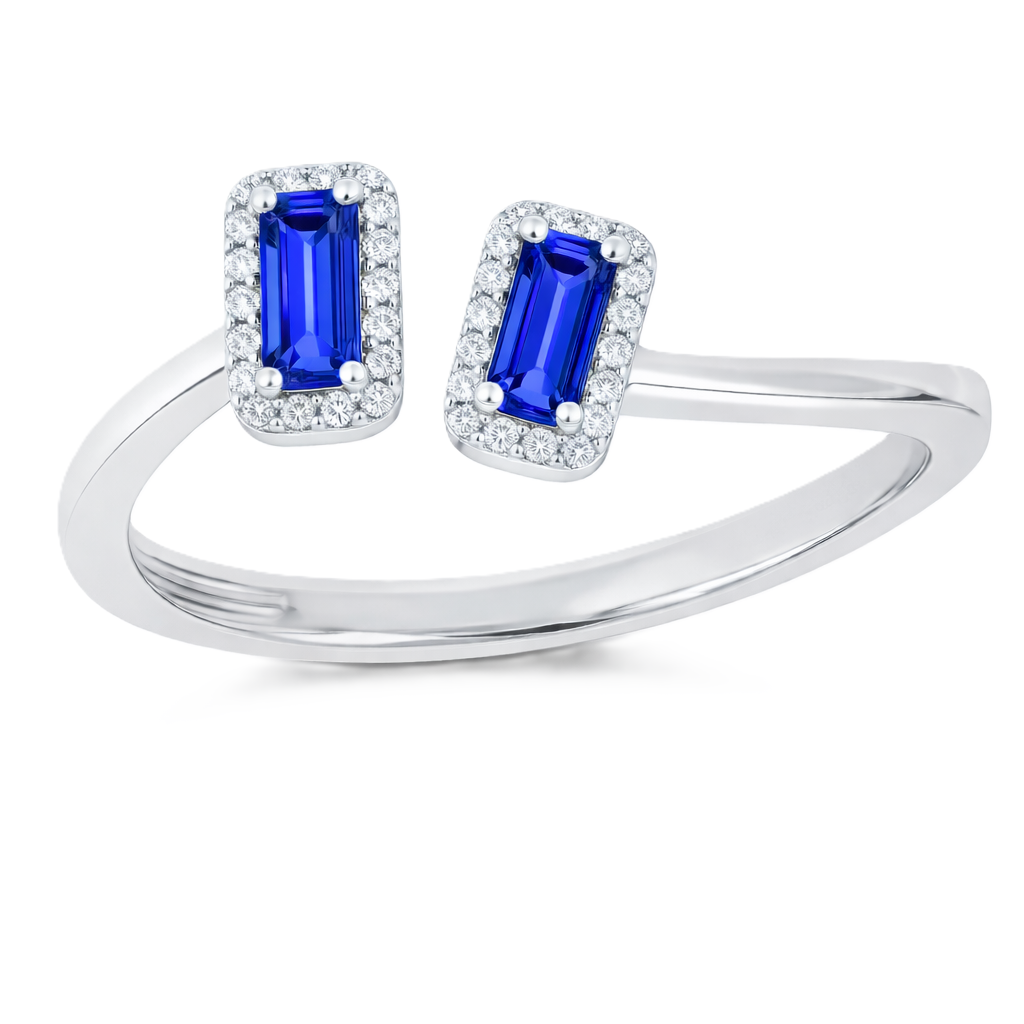 Blue sapphire ring with 6×3 mm baguette cut stones in white gold-plated 925 silver, accented with moissanite. Modern and elegant. Available now at BSI Jewelry.