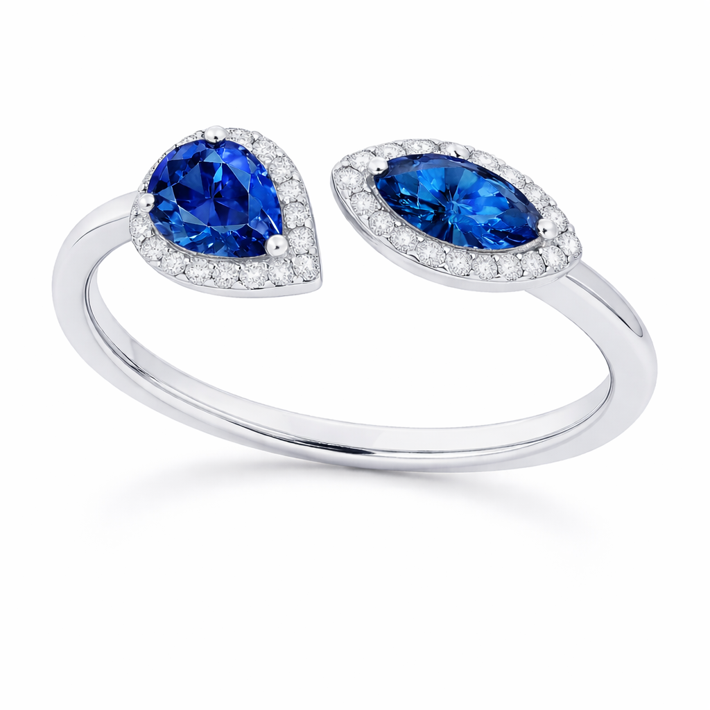 Blue sapphire ring with 6×3 mm pear and marquise cuts, crafted in white gold-plated 925 silver with moissanite accents. Available now at BSI Jewelry.