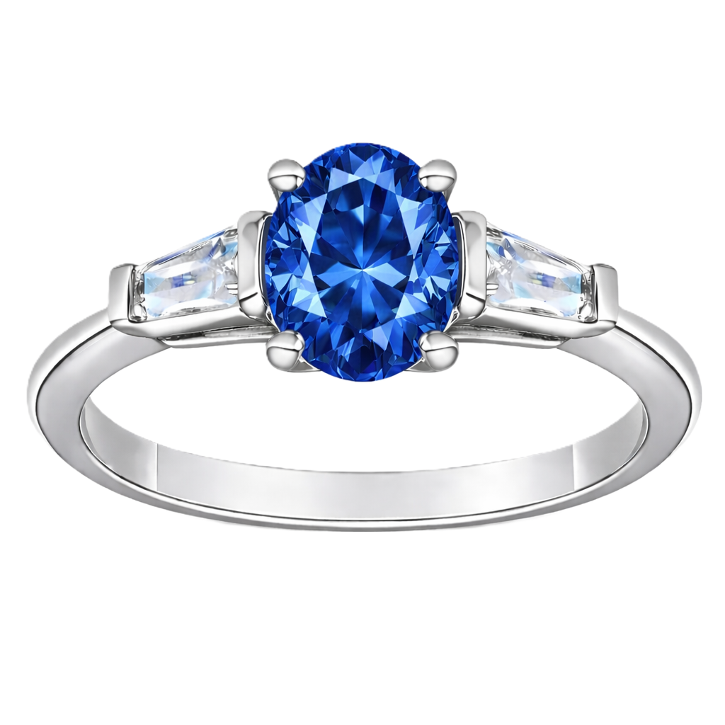 Blue sapphire ring with 7×5 mm oval center in white gold-plated 925 silver. Classic, elegant, and hypoallergenic. Available now at BSI Jewelry.