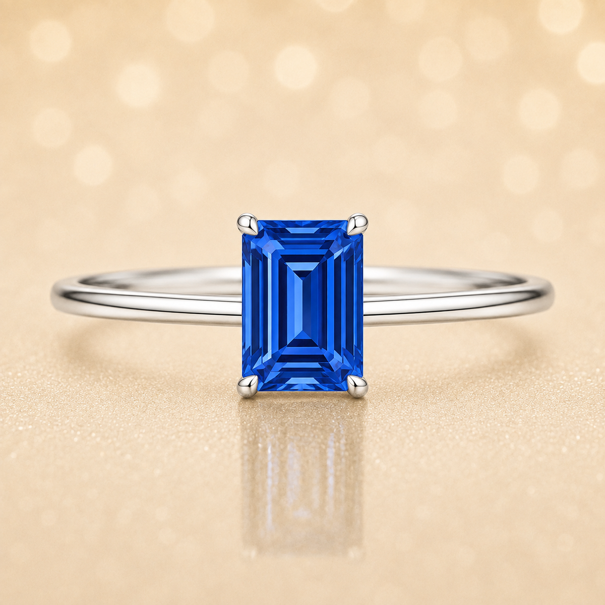 Elegant 6×4 mm emerald-cut blue sapphire ring crafted in white gold-plated 925 silver with palladium alloy. Timeless brilliance. Available now at BSI Jewelry.
