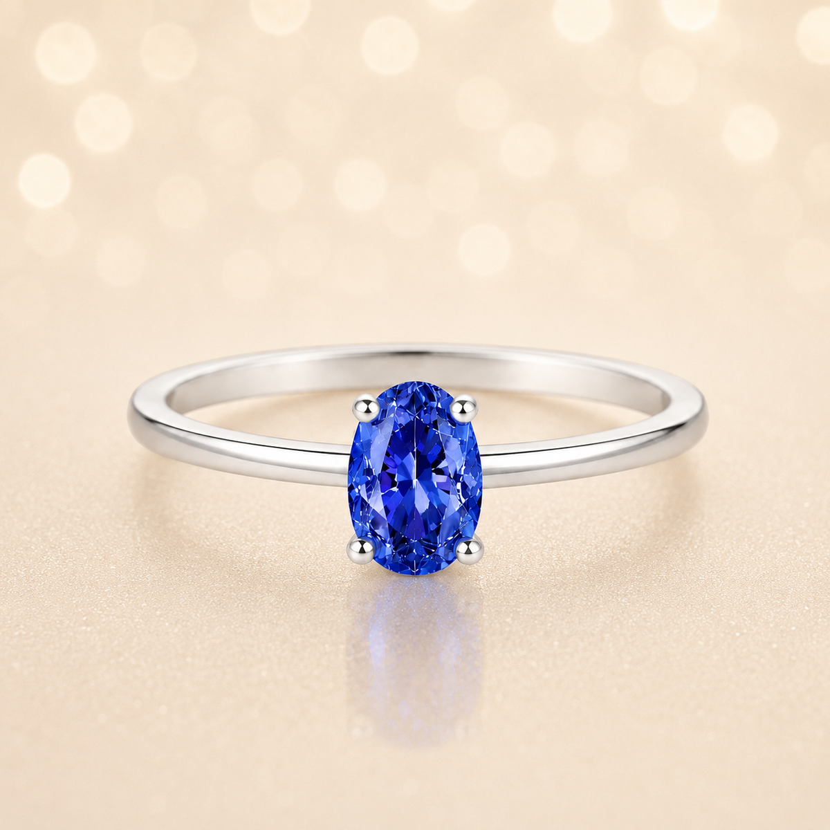 Blue sapphire solitaire ring with a 6×4 mm oval in white gold-plated 925 silver. Elegant, minimal, and timeless for daily wear. Available now at BSI Jewelry.