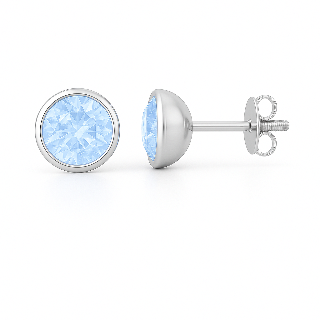 Blue sapphire stud earrings with 5 mm round stones, crafted in white gold-plated 925 silver. Timeless sparkle and elegant beauty. Available now at BSI Jewelry.