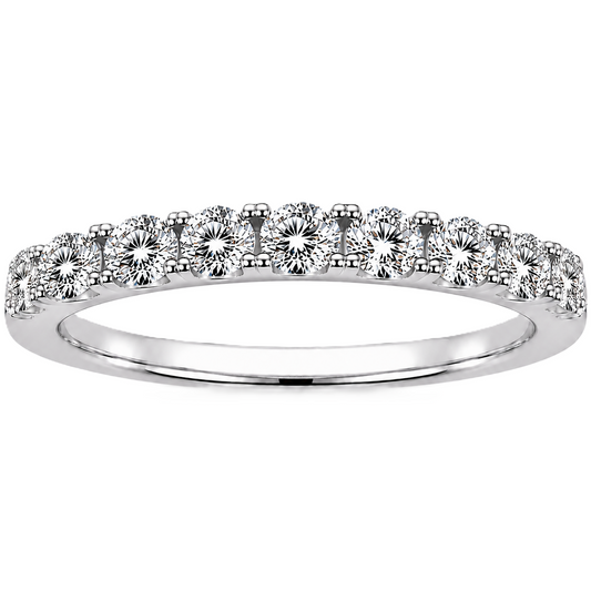 Round moissanite wedding band crafted in white gold-plated 925 silver. Elegant brilliance and timeless sparkle for everyday wear. Available now at BSI Jewelry.