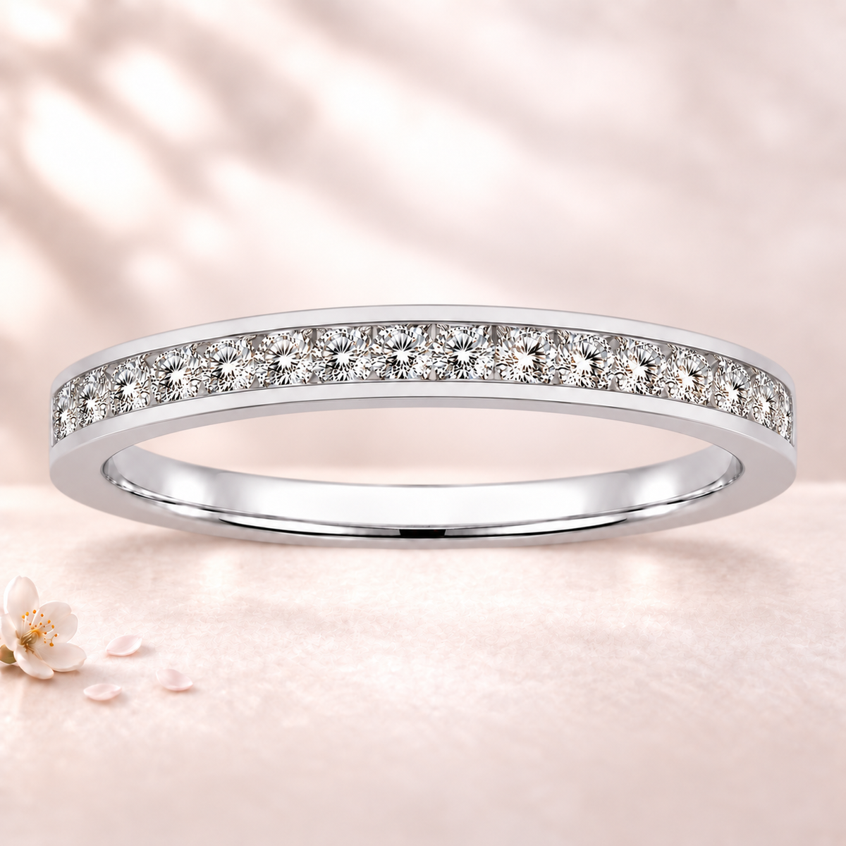 Round moissanite wedding band crafted in white gold-plated 925 silver. Elegant brilliance and timeless sparkle for everyday wear. Available now at BSI Jewelry.