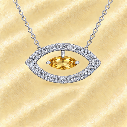 Citrine necklace with a 7×3.5 mm marquise-cut stone in white gold-plated 925 silver, accented with moissanite. Available now at BSI Jewelry.
