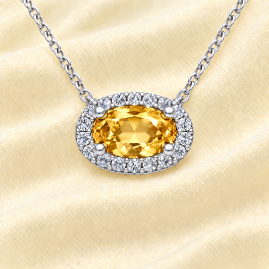 Citrine necklace with a 7×4 mm oval in white gold-plated 925 silver, accented with moissanite. Elegant and refined for daily wear. Available now at BSI Jewelry.