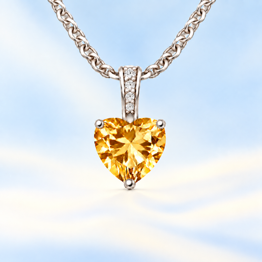 Citrine pendant with a 6 mm heart gemstone in white gold-plated 925 silver. Bright, elegant, and radiant for daily wear. Available now at BSI Jewelry.