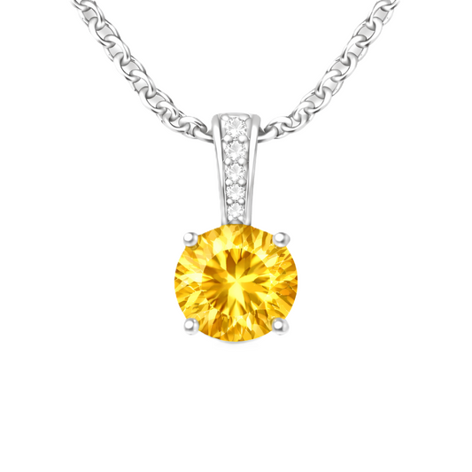 Citrine pendant with a 6 mm round cut, set in white gold-plated 925 silver. Warm, radiant, and elegant for daily wear. Available now at BSI Jewelry.