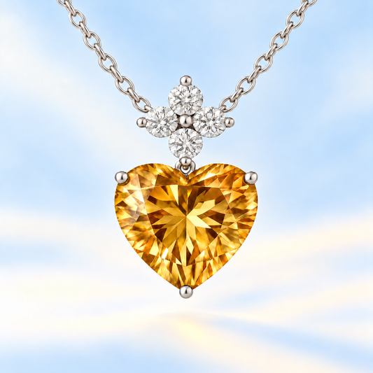 Radiant 7mm heart-cut Citrine pendant with Moissanite accents in white-gold-plated 925 silver. Joyful brilliance and timeless charm. Available at BSI Jewelry.
