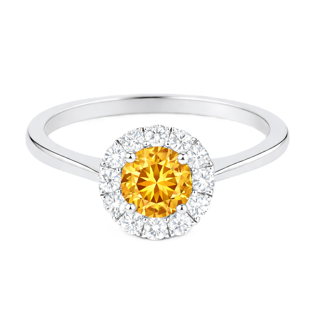 Citrine ring with a 4.50 mm round-cut stone in white gold-plated 925 silver, accented with moissanite for warm golden brilliance. Available now at BSI Jewelry.