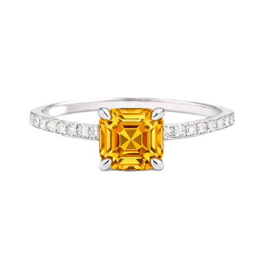Citrine ring with a 6 mm Asscher-cut stone in white gold-plated 925 silver, accented with moissanite and warm golden brilliance. Available now at BSI Jewelry.