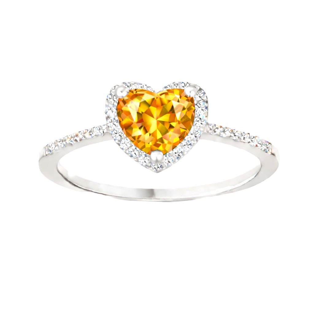 Citrine ring with a 6 mm heart cut, crafted in white gold-plated 925 silver and accented with moissanite. Available now at BSI Jewelry.