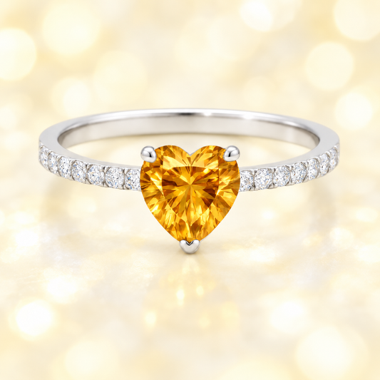 Citrine ring with a 6 mm heart-cut in white gold-plated 925 silver, accented with moissanite. Romantic and elegant for daily wear. Available now at BSI Jewelry.