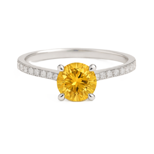 Citrine ring with a 6 mm round-cut and moissanite accents, crafted in white gold-plated 925 silver. Elegant for daily wear. Available now at BSI Jewelry.