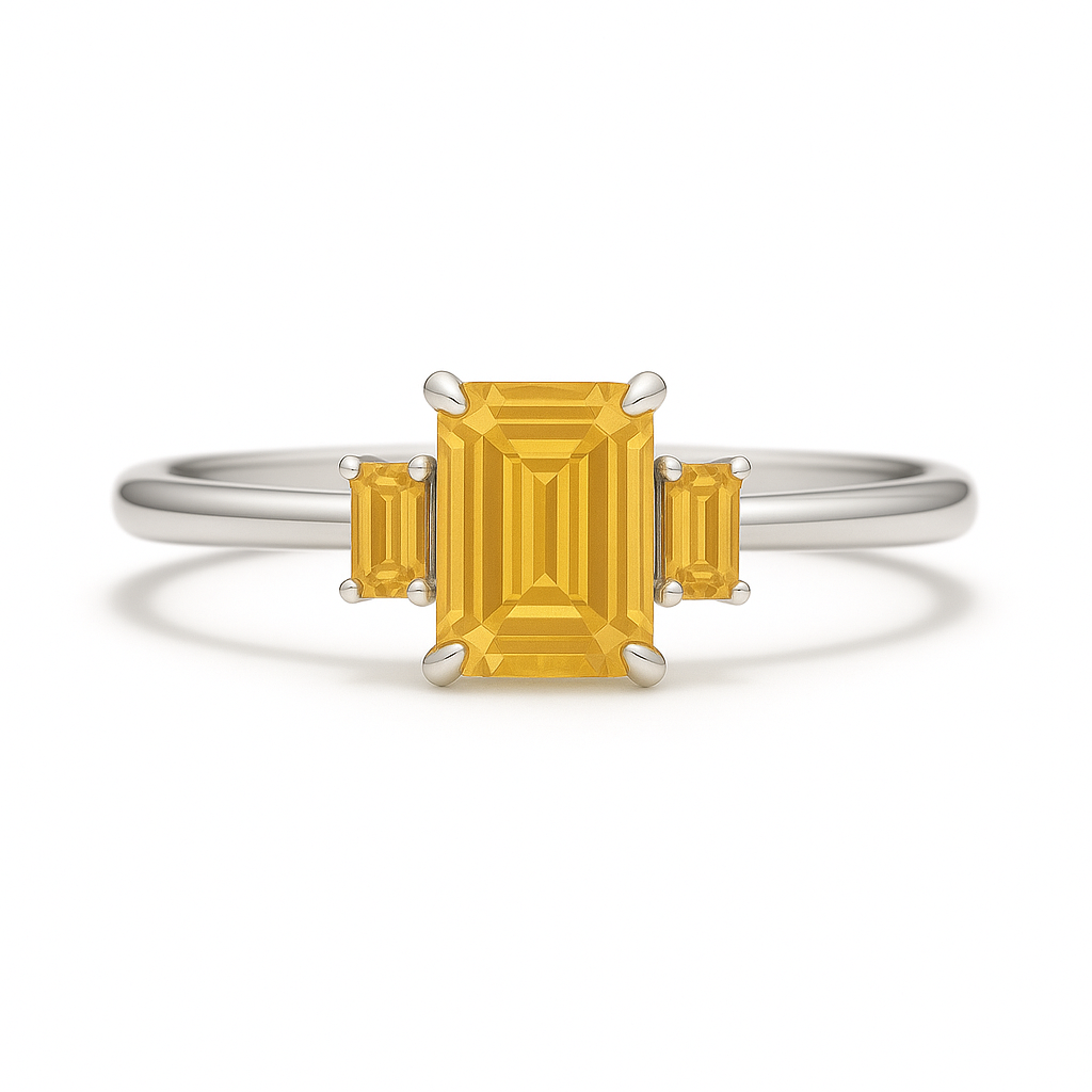 Vibrant citrine ring with 6×4mm and 4×2mm emerald-cut stones in white gold-plated 925 silver with palladium alloy. Radiant brilliance. Available at BSI Jewelry.