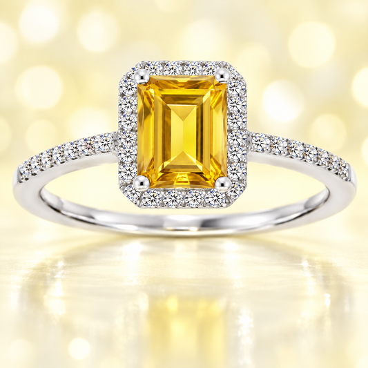 Citrine ring with a 7×5 mm emerald cut, with moissanite in white gold-plated 925 silver. Elegant and timeless for daily wear. Available now at BSI Jewelry.