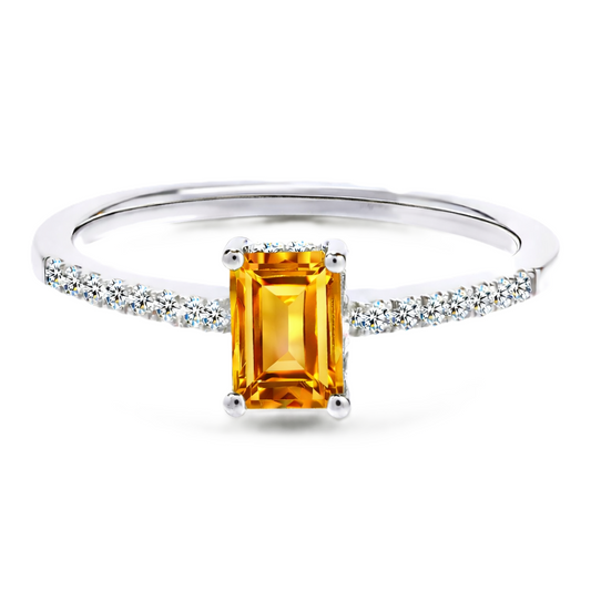 Citrine ring with a 7×5 mm emerald cut in white gold-plated 925 silver, with moissanite. Elegant and refined for daily wear. Available now at BSI Jewelry.