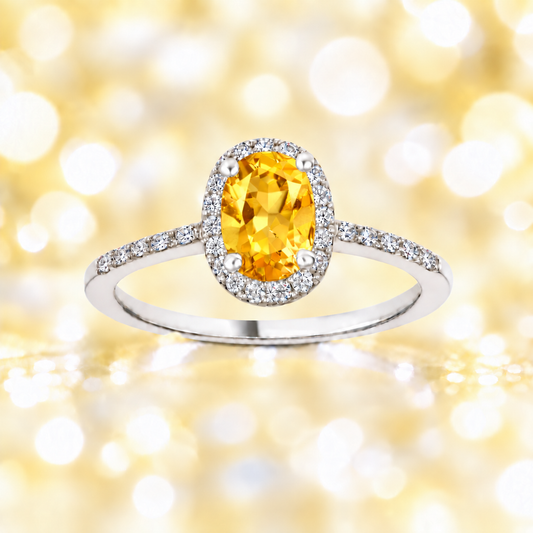 Citrine ring with a 7×5 mm oval-cut in white gold-plated 925 silver, accented with moissanite. Elegant and refined for daily wear. Available now at BSI Jewelry.