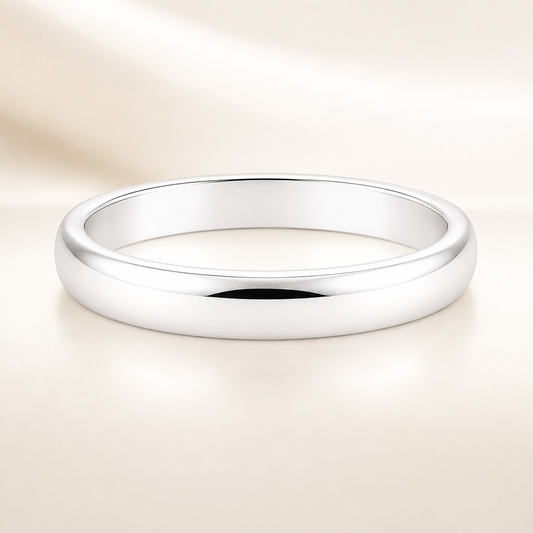 Classic 3 mm comfort-fit plain wedding band crafted in white gold-plated 925 silver with palladium-added alloy. Everlasting love. Available now at BSI Jewelry.