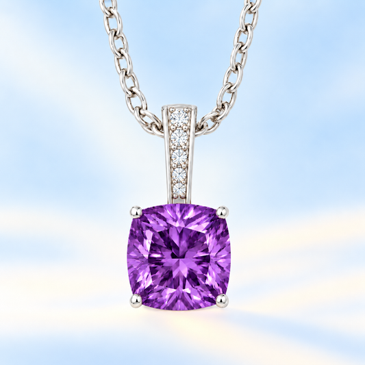 Amethyst cushion pendant in white gold-plated 925 silver with moissanite accents. Elegant and hypoallergenic. Available now at BSI Jewelry.