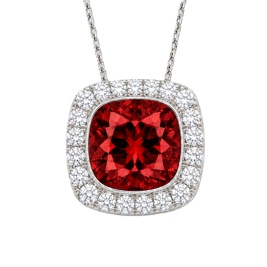 Garnet cushion pendant, 6 mm cushion center with halo, crafted in white gold-plated 925 silver. Rich, warm, and elegant. Available now at BSI Jewelry.