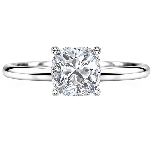 Timeless cushion moissanite engagement ring with a 6 mm cushion-cut center stone, crafted in white gold plated 925 silver. Available now at BSI Jewelry.