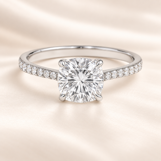 Fall in love with this 6mm Cushion Moissanite Engagement Ring in White Gold Plated 925 Silver. GRA Certified, hypoallergenic, and finely crafted by BSI Jewelry.
