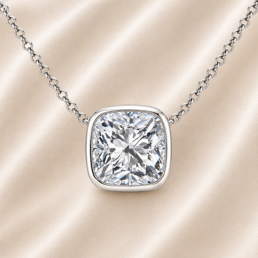 Cushion moissanite necklace, 10 mm cushion, set in white gold-plated 925 silver. Brilliant sparkle, hypoallergenic elegance. Available now at BSI Jewelry.