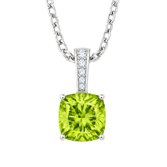 Peridot cushion pendant in white gold-plated 925 silver with moissanite accents. Elegant and hypoallergenic. Available now at BSI Jewelry.