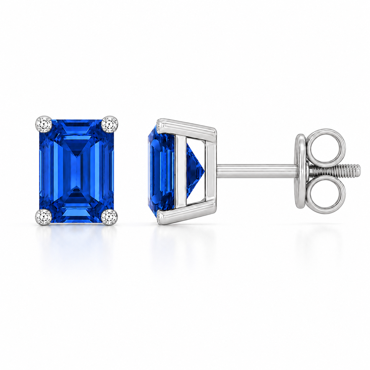 Emerald blue sapphire stud earrings with 6×4 mm stones and moissanite prongs in white gold plated 925 silver. Available now at BSI Jewelry.