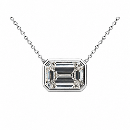 Emerald moissanite necklace, 11 x 9 mm emerald, set in white gold-plated 925 silver. Step-cut brilliance, hypoallergenic elegance. Available now at BSI Jewelry.