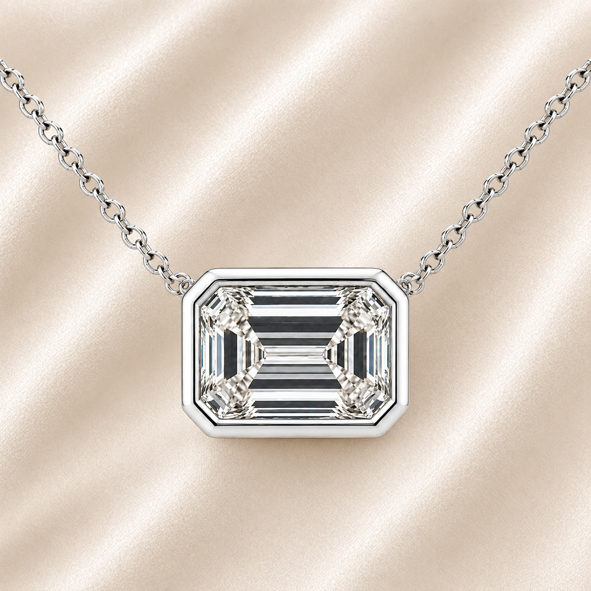 Emerald moissanite necklace, 11 x 9 mm emerald, set in white gold-plated 925 silver. Step-cut brilliance, hypoallergenic elegance. Available now at BSI Jewelry.