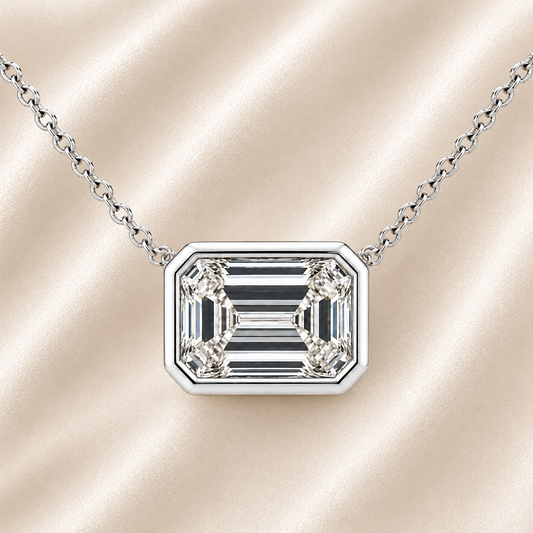 Emerald moissanite necklace, 11 x 9 mm emerald, set in white gold-plated 925 silver. Step-cut brilliance, hypoallergenic elegance. Available now at BSI Jewelry.